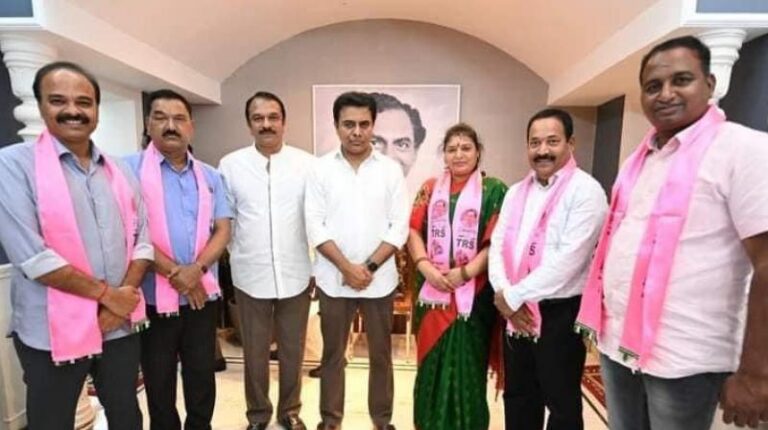 KTR inducts 4 BJP corporators